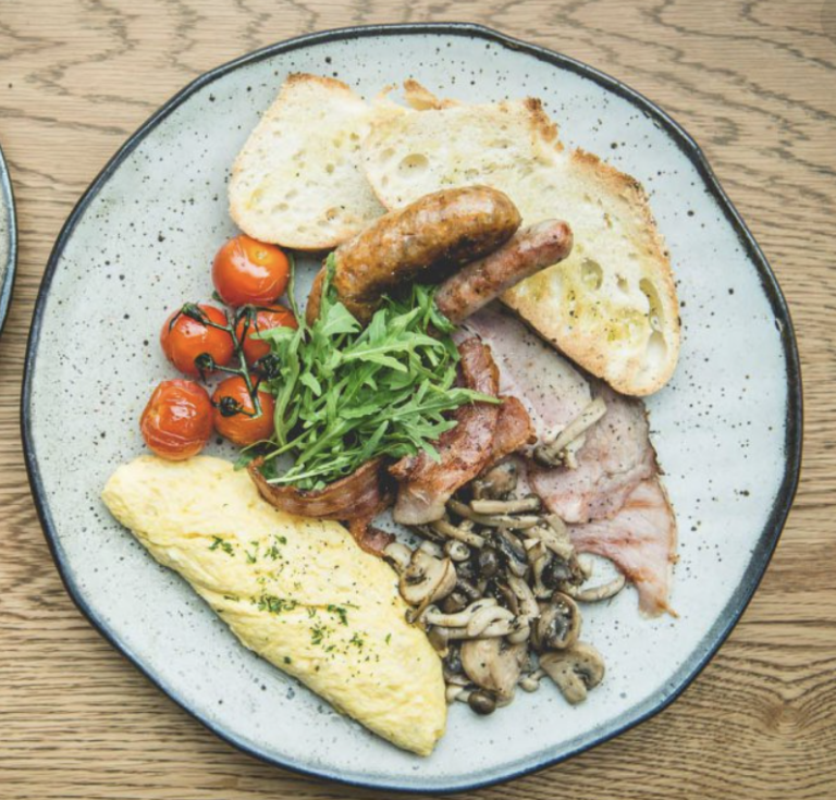 omelette sausage bacon tomato and toast brunch menu